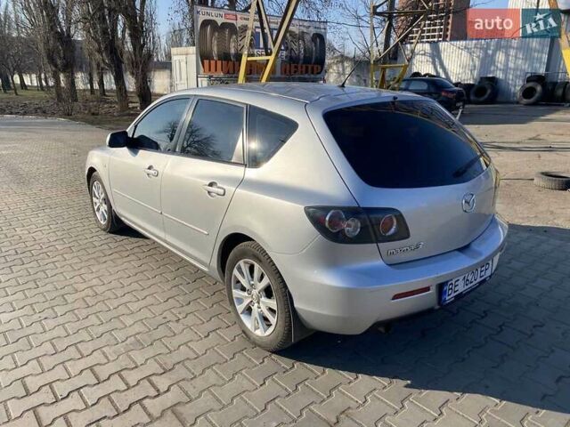 Серый Мазда 3, объемом двигателя 2 л и пробегом 301 тыс. км за 5400 $, фото 6 на Automoto.ua