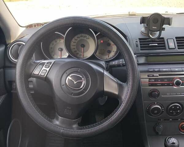 Серый Мазда 3, объемом двигателя 1.6 л и пробегом 230 тыс. км за 4900 $, фото 12 на Automoto.ua