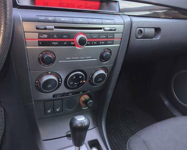 Серый Мазда 3, объемом двигателя 1.6 л и пробегом 185 тыс. км за 5999 $, фото 5 на Automoto.ua
