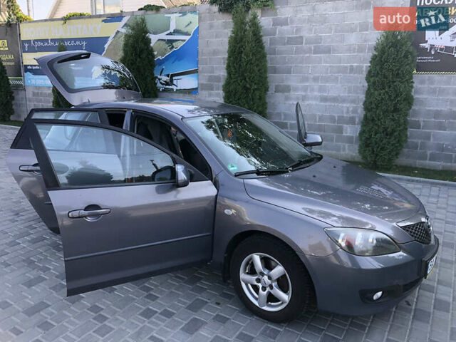 Сірий Мазда 3, об'ємом двигуна 1.6 л та пробігом 255 тис. км за 4900 $, фото 4 на Automoto.ua