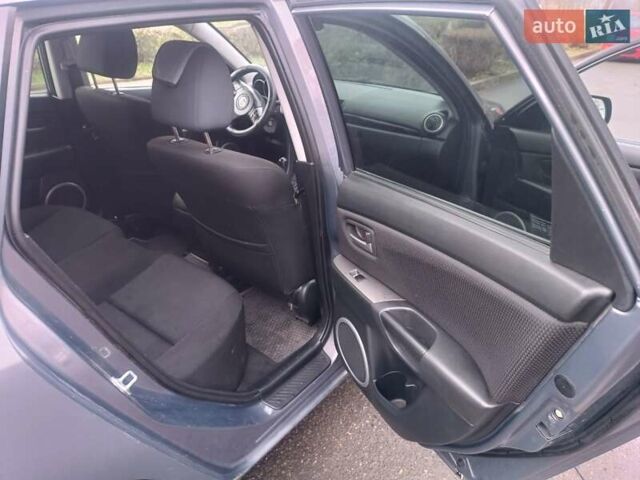 Серый Мазда 3, объемом двигателя 1.56 л и пробегом 269 тыс. км за 5200 $, фото 13 на Automoto.ua