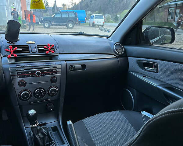 Серый Мазда 3, объемом двигателя 1.6 л и пробегом 248 тыс. км за 4600 $, фото 15 на Automoto.ua