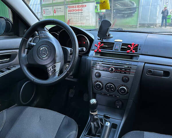 Серый Мазда 3, объемом двигателя 1.6 л и пробегом 248 тыс. км за 4600 $, фото 14 на Automoto.ua