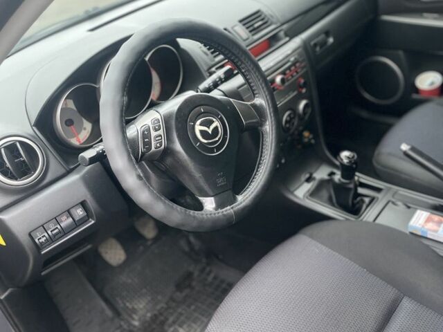 Серый Мазда 3, объемом двигателя 1.6 л и пробегом 290 тыс. км за 4999 $, фото 7 на Automoto.ua