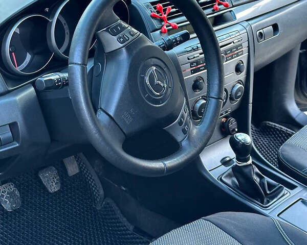 Серый Мазда 3, объемом двигателя 1.6 л и пробегом 248 тыс. км за 4600 $, фото 20 на Automoto.ua