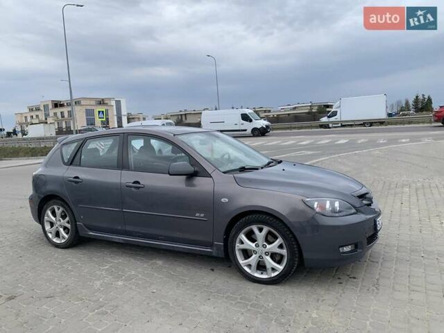 Серый Мазда 3, объемом двигателя 2.26 л и пробегом 223 тыс. км за 5500 $, фото 3 на Automoto.ua