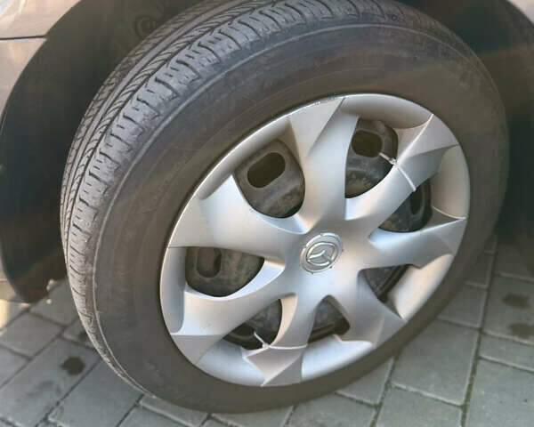 Сірий Мазда 3, об'ємом двигуна 2 л та пробігом 298 тис. км за 4900 $, фото 6 на Automoto.ua