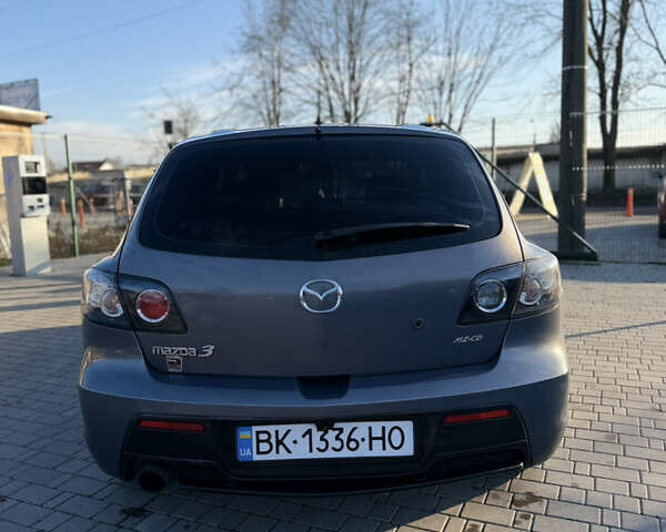 Сірий Мазда 3, об'ємом двигуна 2 л та пробігом 298 тис. км за 4900 $, фото 3 на Automoto.ua