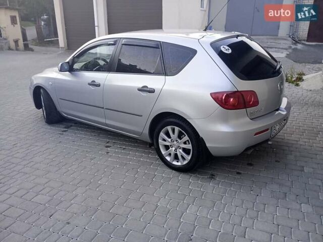 Серый Мазда 3, объемом двигателя 1.6 л и пробегом 229 тыс. км за 5200 $, фото 2 на Automoto.ua