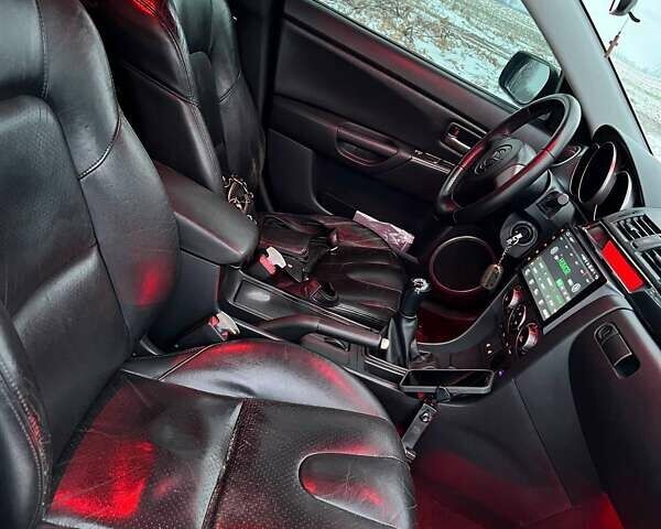 Серый Мазда 3, объемом двигателя 1.6 л и пробегом 320 тыс. км за 7999 $, фото 8 на Automoto.ua