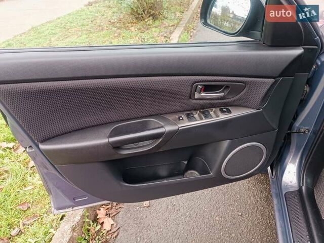 Серый Мазда 3, объемом двигателя 1.56 л и пробегом 269 тыс. км за 5200 $, фото 16 на Automoto.ua