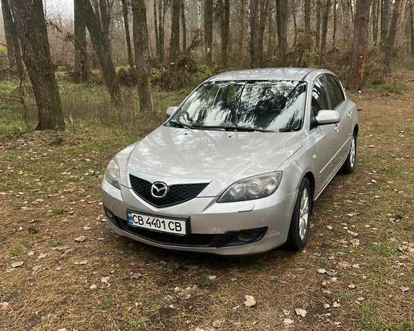 Серый Мазда 3, объемом двигателя 1.6 л и пробегом 217 тыс. км за 4300 $, фото 1 на Automoto.ua