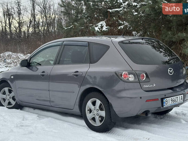 Сірий Мазда 3, об'ємом двигуна 1.6 л та пробігом 220 тис. км за 5777 $, фото 30 на Automoto.ua