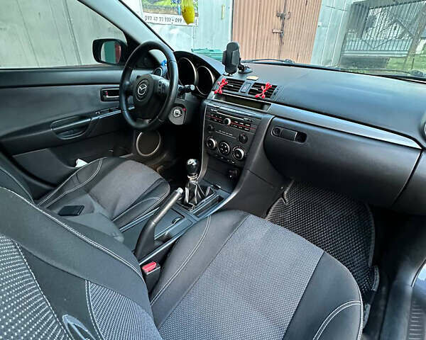 Серый Мазда 3, объемом двигателя 1.6 л и пробегом 248 тыс. км за 4600 $, фото 27 на Automoto.ua