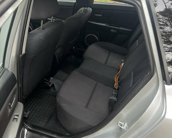 Серый Мазда 3, объемом двигателя 1.6 л и пробегом 217 тыс. км за 4300 $, фото 11 на Automoto.ua