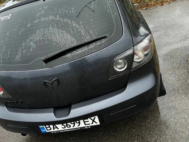 Серый Мазда 3, объемом двигателя 1.6 л и пробегом 190 тыс. км за 5000 $, фото 1 на Automoto.ua