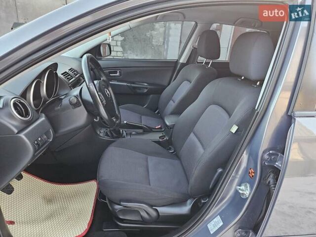 Сірий Мазда 3, об'ємом двигуна 1.6 л та пробігом 289 тис. км за 5300 $, фото 63 на Automoto.ua