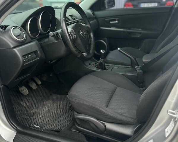 Серый Мазда 3, объемом двигателя 1.6 л и пробегом 155 тыс. км за 4900 $, фото 7 на Automoto.ua