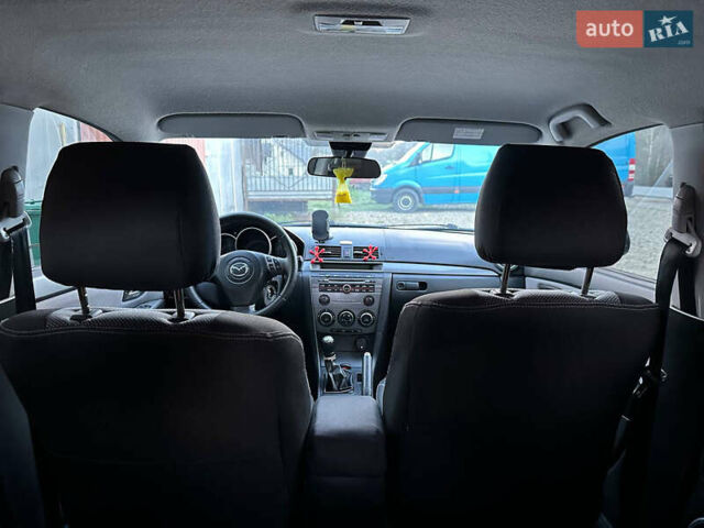 Серый Мазда 3, объемом двигателя 1.6 л и пробегом 248 тыс. км за 4600 $, фото 31 на Automoto.ua