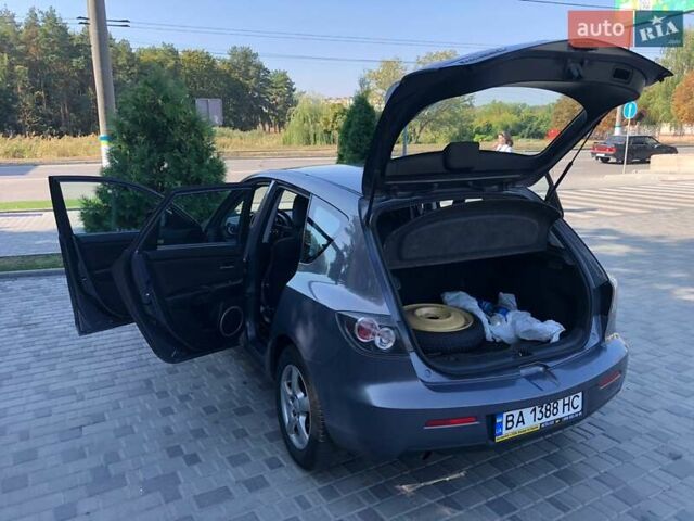Сірий Мазда 3, об'ємом двигуна 1.6 л та пробігом 255 тис. км за 4900 $, фото 10 на Automoto.ua