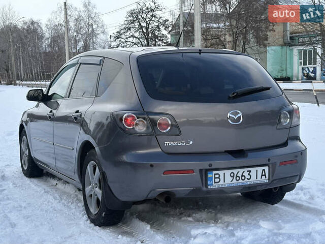 Серый Мазда 3, объемом двигателя 1.6 л и пробегом 200 тыс. км за 5999 $, фото 5 на Automoto.ua