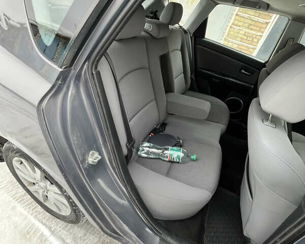 Серый Мазда 3, объемом двигателя 1.6 л и пробегом 249 тыс. км за 3900 $, фото 21 на Automoto.ua