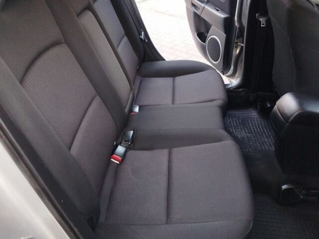 Сірий Мазда 3, об'ємом двигуна 2 л та пробігом 240 тис. км за 5399 $, фото 6 на Automoto.ua