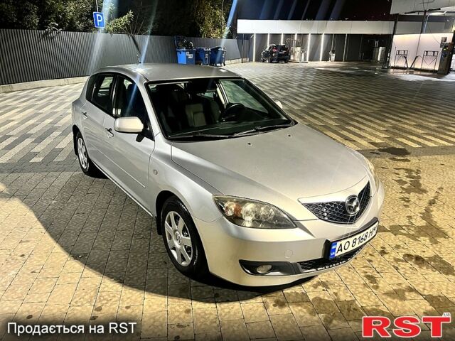 Серый Мазда 3, объемом двигателя 1.6 л и пробегом 86 тыс. км за 5600 $, фото 1 на Automoto.ua