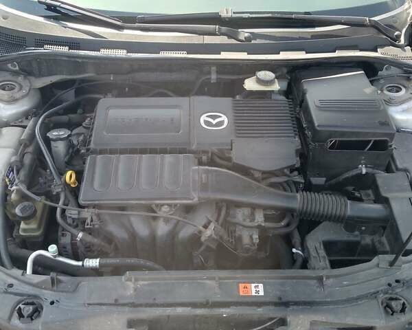 Серый Мазда 3, объемом двигателя 1.6 л и пробегом 230 тыс. км за 4900 $, фото 19 на Automoto.ua