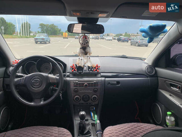 Сірий Мазда 3, об'ємом двигуна 1.6 л та пробігом 263 тис. км за 4500 $, фото 17 на Automoto.ua