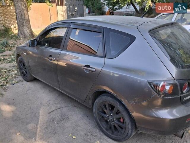 Сірий Мазда 3, об'ємом двигуна 1.6 л та пробігом 266 тис. км за 5000 $, фото 5 на Automoto.ua