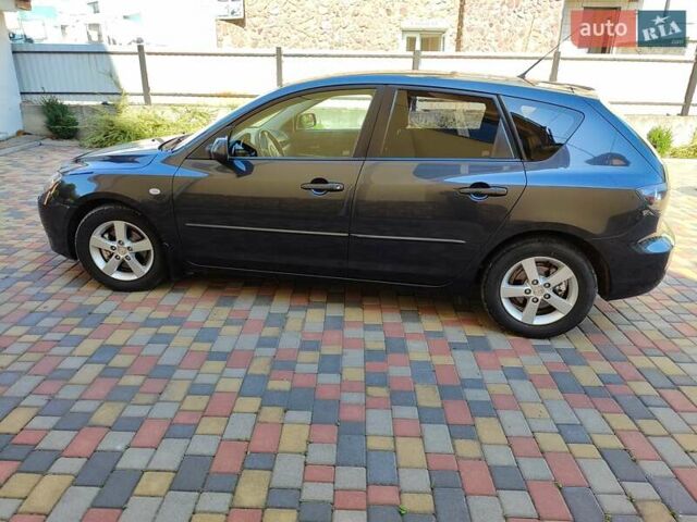Сірий Мазда 3, об'ємом двигуна 1.6 л та пробігом 275 тис. км за 4950 $, фото 3 на Automoto.ua