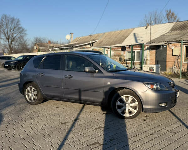 Сірий Мазда 3, об'ємом двигуна 2 л та пробігом 298 тис. км за 4900 $, фото 1 на Automoto.ua