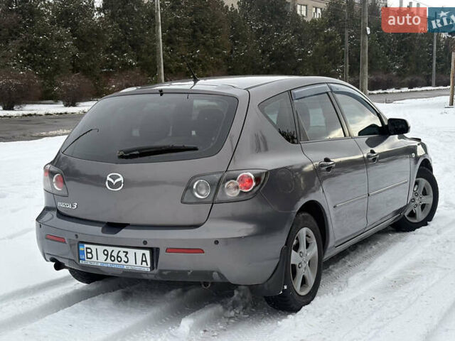 Серый Мазда 3, объемом двигателя 1.6 л и пробегом 200 тыс. км за 5999 $, фото 23 на Automoto.ua