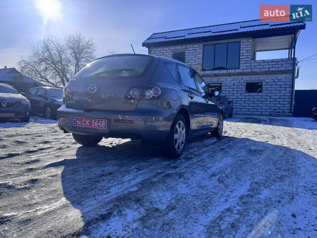Серый Мазда 3, объемом двигателя 1.4 л и пробегом 240 тыс. км за 5590 $, фото 10 на Automoto.ua