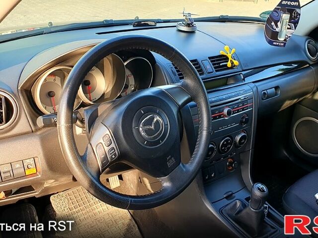Сірий Мазда 3, об'ємом двигуна 1.6 л та пробігом 205 тис. км за 5000 $, фото 7 на Automoto.ua