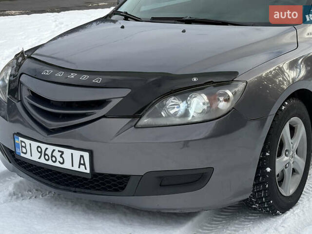 Серый Мазда 3, объемом двигателя 1.6 л и пробегом 200 тыс. км за 5999 $, фото 29 на Automoto.ua