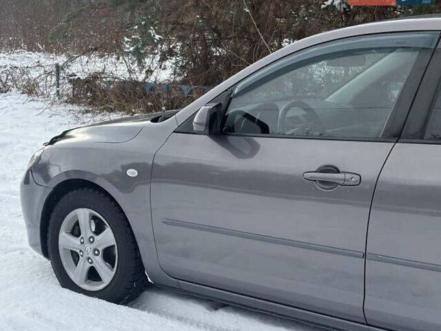 Серый Мазда 3, объемом двигателя 1.6 л и пробегом 200 тыс. км за 5999 $, фото 32 на Automoto.ua