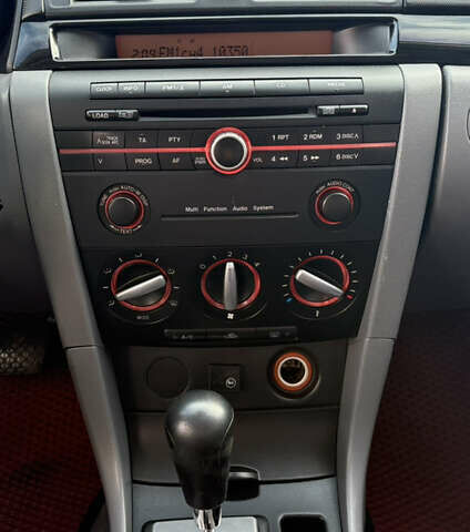 Сірий Мазда 3, об'ємом двигуна 1.6 л та пробігом 220 тис. км за 5777 $, фото 47 на Automoto.ua