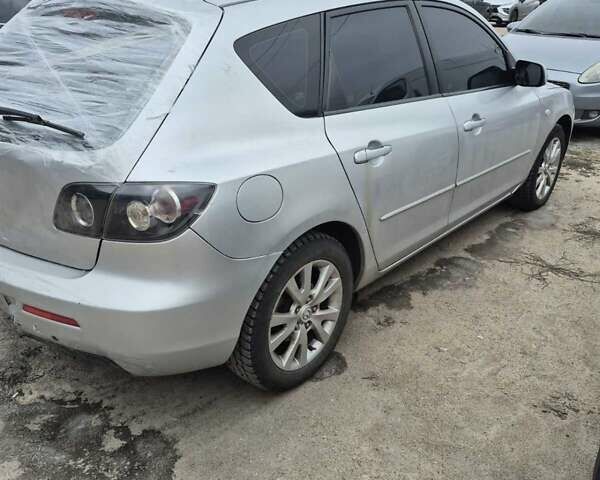 Серый Мазда 3, объемом двигателя 1.6 л и пробегом 315 тыс. км за 3400 $, фото 3 на Automoto.ua