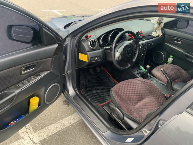 Сірий Мазда 3, об'ємом двигуна 1.6 л та пробігом 263 тис. км за 4500 $, фото 16 на Automoto.ua