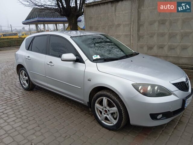 Серый Мазда 3, объемом двигателя 2 л и пробегом 260 тыс. км за 4300 $, фото 1 на Automoto.ua