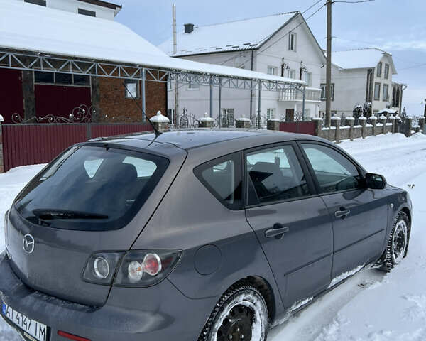 Серый Мазда 3, объемом двигателя 1.6 л и пробегом 213 тыс. км за 5500 $, фото 6 на Automoto.ua