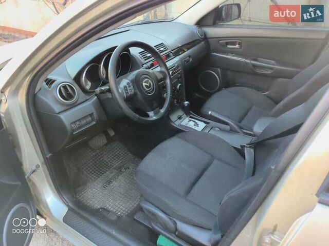 Серый Мазда 3, объемом двигателя 1.6 л и пробегом 185 тыс. км за 5999 $, фото 3 на Automoto.ua