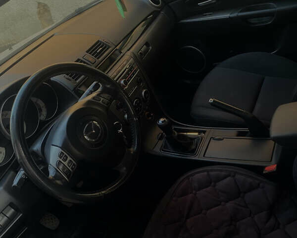 Серый Мазда 3, объемом двигателя 2 л и пробегом 177 тыс. км за 4900 $, фото 4 на Automoto.ua
