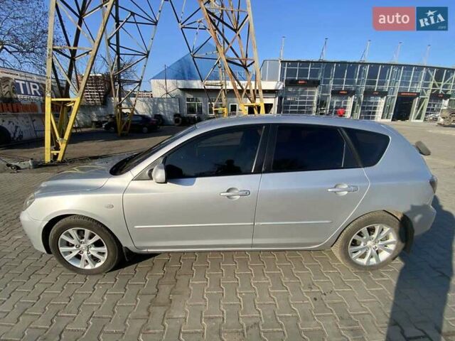 Серый Мазда 3, объемом двигателя 2 л и пробегом 301 тыс. км за 5400 $, фото 7 на Automoto.ua