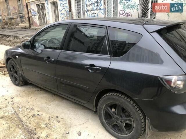 Серый Мазда 3, объемом двигателя 1.6 л и пробегом 160 тыс. км за 5000 $, фото 2 на Automoto.ua