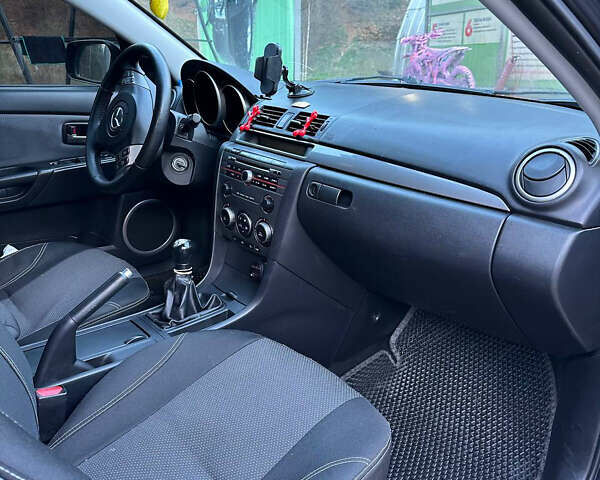 Серый Мазда 3, объемом двигателя 1.6 л и пробегом 248 тыс. км за 4600 $, фото 22 на Automoto.ua