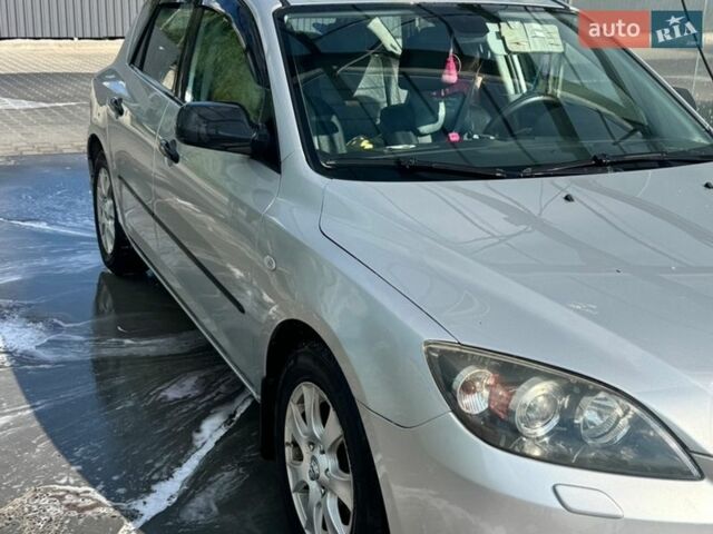 Серый Мазда 3, объемом двигателя 1.6 л и пробегом 210 тыс. км за 4900 $, фото 1 на Automoto.ua