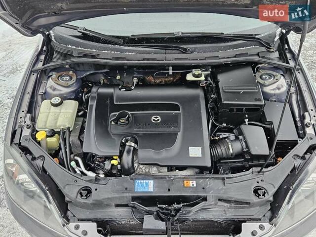 Сірий Мазда 3, об'ємом двигуна 1.6 л та пробігом 289 тис. км за 5300 $, фото 50 на Automoto.ua